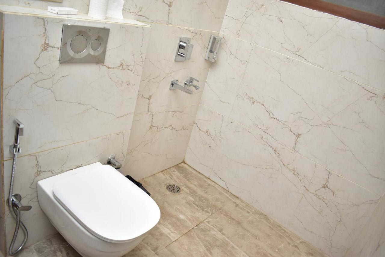 Qotel Hotel Signature Bnb-Ashok Vihar New Delhi Extérieur photo